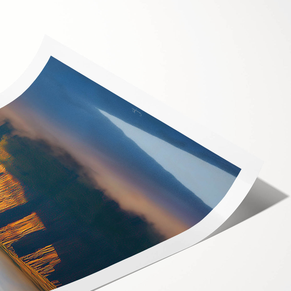 Rolled print showcasing a stunning landscape of cliffs with vibrant colors and intricate details, designed for wall decor in contemporary interiors, packaged securely in a cardboard tube for safe delivery.