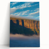 Stretched canvas art showcasing a dramatic landscape of towering cliffs under a vibrant sunset, perfect for enhancing modern home decor with nature-inspired elegance.