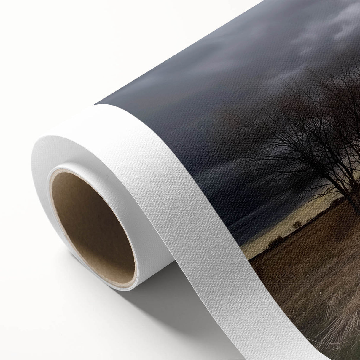 Rolled canvas print showcasing a vibrant landscape design featuring a rustic barn surrounded by lush greenery, elegantly packaged in a protective cardboard tube for easy transport and storage.
