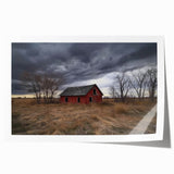 Landscape barn print rolled canvas showcasing rustic farm scenery with vibrant green fields, blue sky, and a classic red barn, securely packaged for delivery.