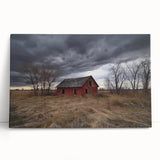 Stretched canvas artwork depicting a tranquil landscape scene of a rustic barn surrounded by lush greenery, perfect for home or office decor. The warm colors and serene setting evoke a sense of calm and nostalgia, ideal for enhancing any interior space.