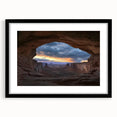 Framed landscape artwork of canyons with a black mat, showcasing intricate details and vibrant colors, ideal for home decor and art enthusiasts.