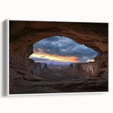 Framed landscape canvas depicting vibrant canyons in rich hues, showcasing natural beauty with a white frame, ideal for modern home decor and art enthusiasts.