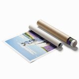 Rolled print of a serene countryside landscape showcasing lush green fields under a clear blue sky, elegantly packaged in a protective cardboard tube for safe shipping.