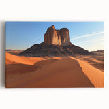 Stretched canvas artwork depicting a vibrant desert landscape with warm tones of orange and yellow, capturing the essence of arid beauty in a modern home decor setting.