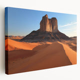 Desert landscape canvas art showcasing vibrant hues of orange and yellow, depicting a serene sunset over rolling dunes, perfect for home decor or office settings.
