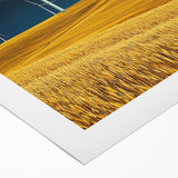 Vibrant landscape canvas print showcasing rolling green fields under a bright blue sky, expertly rolled and ready for framing, perfect for home decor enthusiasts.