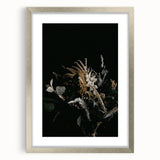 Textured abstract art print depicting autumnal colors in a silver frame, suitable for bedroom art.