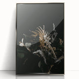 Mid-century modernist art depicting autumn trees in warm orange and brown tones, presented in a silver framed acrylic.