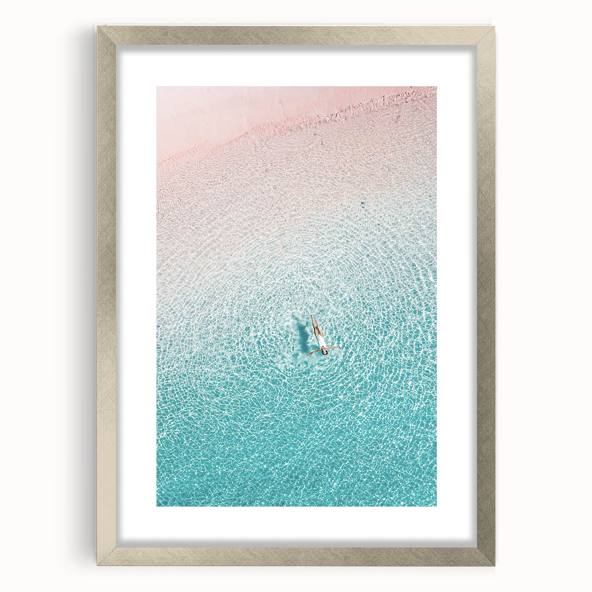 Abstract textured art print featuring swirling blue and white patterns, framed in silver, ideal for bedroom art.
