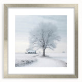 Textured abstract art print depicting a winter scene in cool blue and white tones on a framed silver mat.