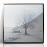 Large abstract wall art featuring wintery scene in muted blue and white, framed acrylic, ideal for modern living room decor.