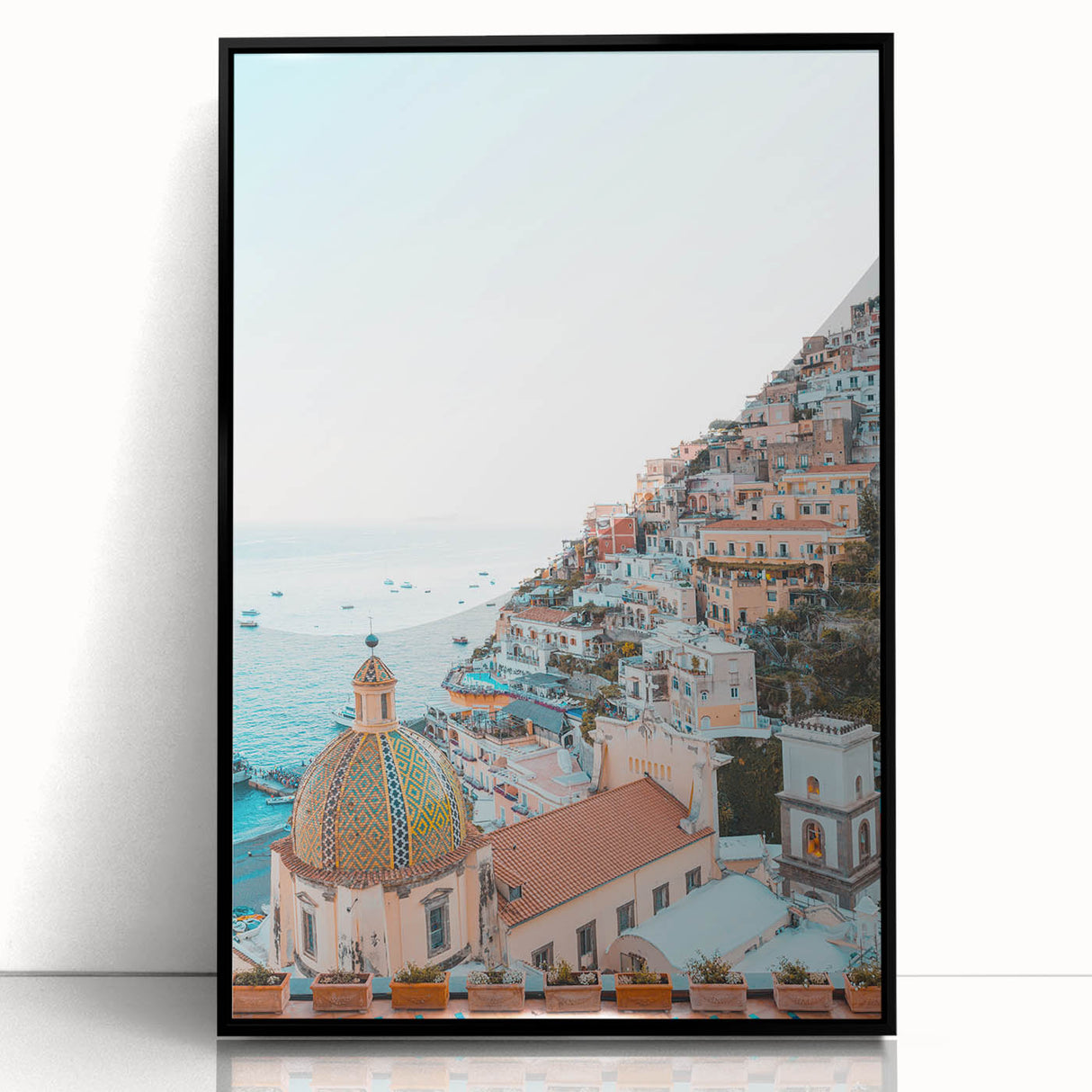 Large abstract wall art featuring swirling blue and orange tones on a black acrylic frame.