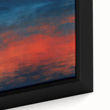 Close-up of a framed abstract strokes wall art piece showcasing vibrant colors of blue, orange, and yellow, perfect for modern home decor.