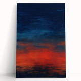 Abstract wall art featuring vibrant, multicolored strokes on stretched canvas, leaning against a neutral wall, ideal for modern home decor and artistic ambiance.