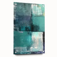 Abstract wall art featuring vibrant strokes in shades of blue, pink, and gold, displayed in a sleek acrylic glass frame with visible mounting pins, perfect for modern decor.