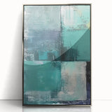 Framed abstract wall art featuring colorful strokes in shades of blue, pink, and gold, set in a sleek silver frame, perfect for modern decor accents.