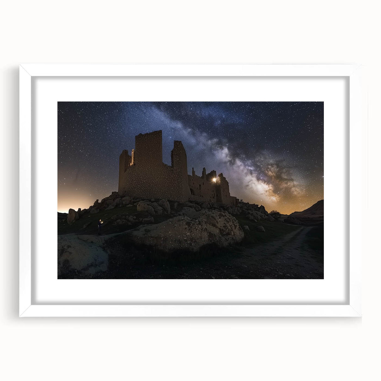 Elegant white-framed landscape artwork showcasing a majestic castle surrounded by lush greenery, perfect for home decor or gallery display.