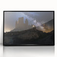 Framed acrylic wall art showcasing a detailed landscape with a castle, presented in a sleek black frame, perfect for enhancing home decor and interior design.