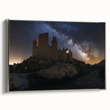 Framed canvas artwork depicting a serene landscape with a majestic castle, featuring a silver frame and vibrant colors, ideal for enhancing home decor.