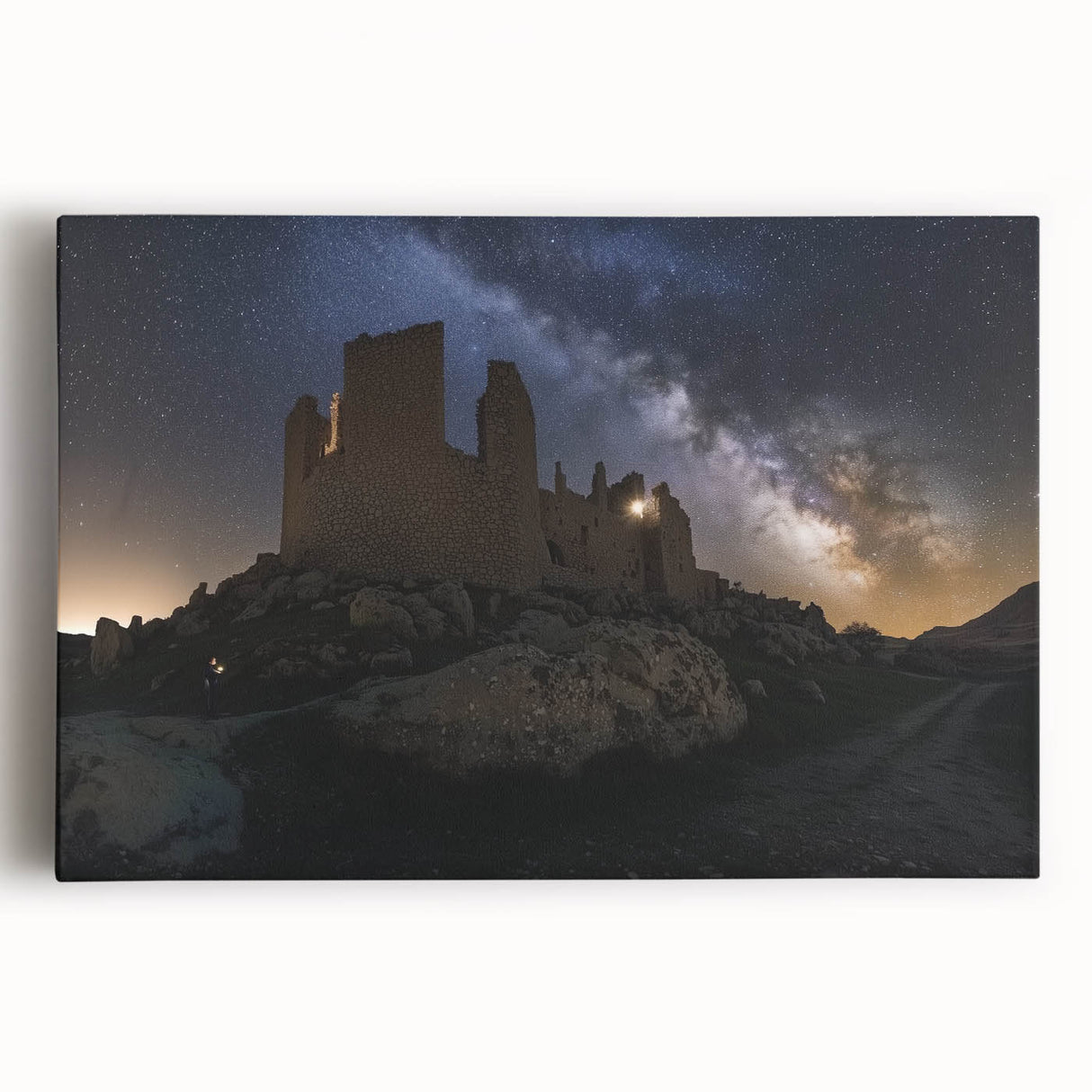 Stretched canvas artwork depicting a picturesque landscape with a majestic castle surrounded by lush greenery and vibrant blue skies, ideal for home decor.