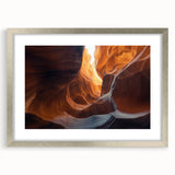 Framed landscape artwork depicting a serene cave scene, featuring a silver mat and sleek frame, ideal for enhancing modern home decor.