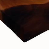 Close-up of a stretched canvas artwork depicting dramatic landscapes and cave formations, featuring rich earth tones and intricate textures, ideal for home decor.