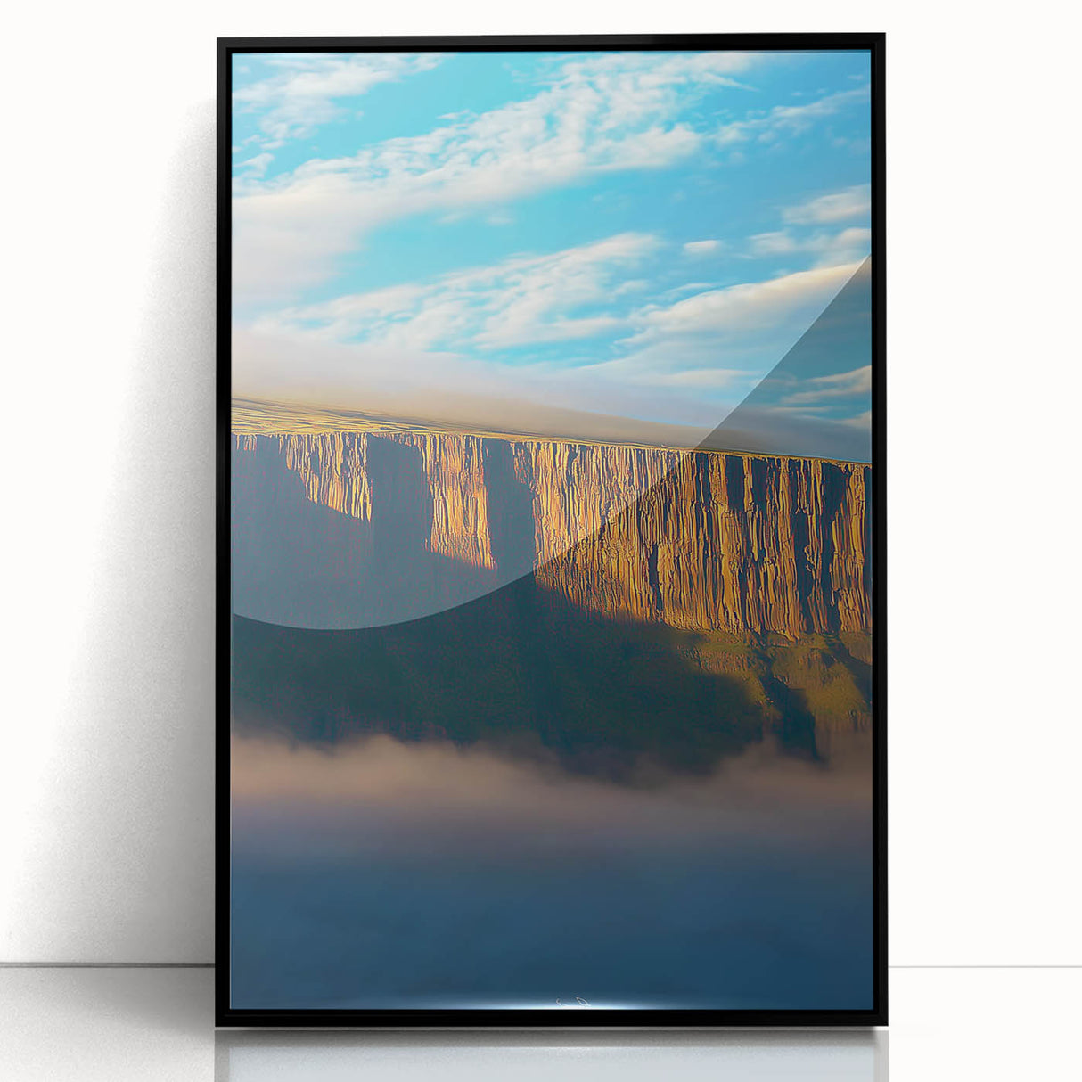 Framed acrylic artwork showcasing a dramatic cliff landscape with rich textures and vibrant colors, set against a sleek black frame, ideal for modern decor.