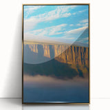 Framed acrylic artwork showcasing a stunning cliff landscape with golden accents, perfect for modern home decor. Ideal for nature enthusiasts and art lovers.