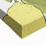 Large art of a close-up black and white landscape painting featuring various fruits, on stretched canvas.