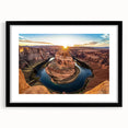 Landscape art print of canyons framed with a sleek black mat, showcasing vibrant earthy tones and intricate details, perfect for modern home decor.