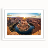 Framed landscape artwork of a stunning canyon scene, featuring vibrant colors and intricate details, presented in a sleek white mat for an elegant display. Perfect for enhancing home decor with a touch of nature's beauty.