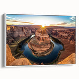 Framed canvas artwork showcasing a stunning desert canyon landscape with warm earthy tones, displayed in a sleek white frame, ideal for home decor.