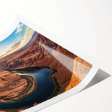 Stunning landscape print showcasing vibrant canyons in rich earth tones, rolled for easy transport, perfect for home decor enthusiasts seeking nature-inspired art.