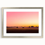 Framed landscape artwork depicting a serene countryside scene with a silver mat, providing an elegant touch to any home decor, ideal for nature lovers.