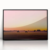 Framed acrylic art piece showcasing a serene countryside landscape with vibrant green fields and a clear blue sky, presented in a sleek black frame, ideal for home decor.