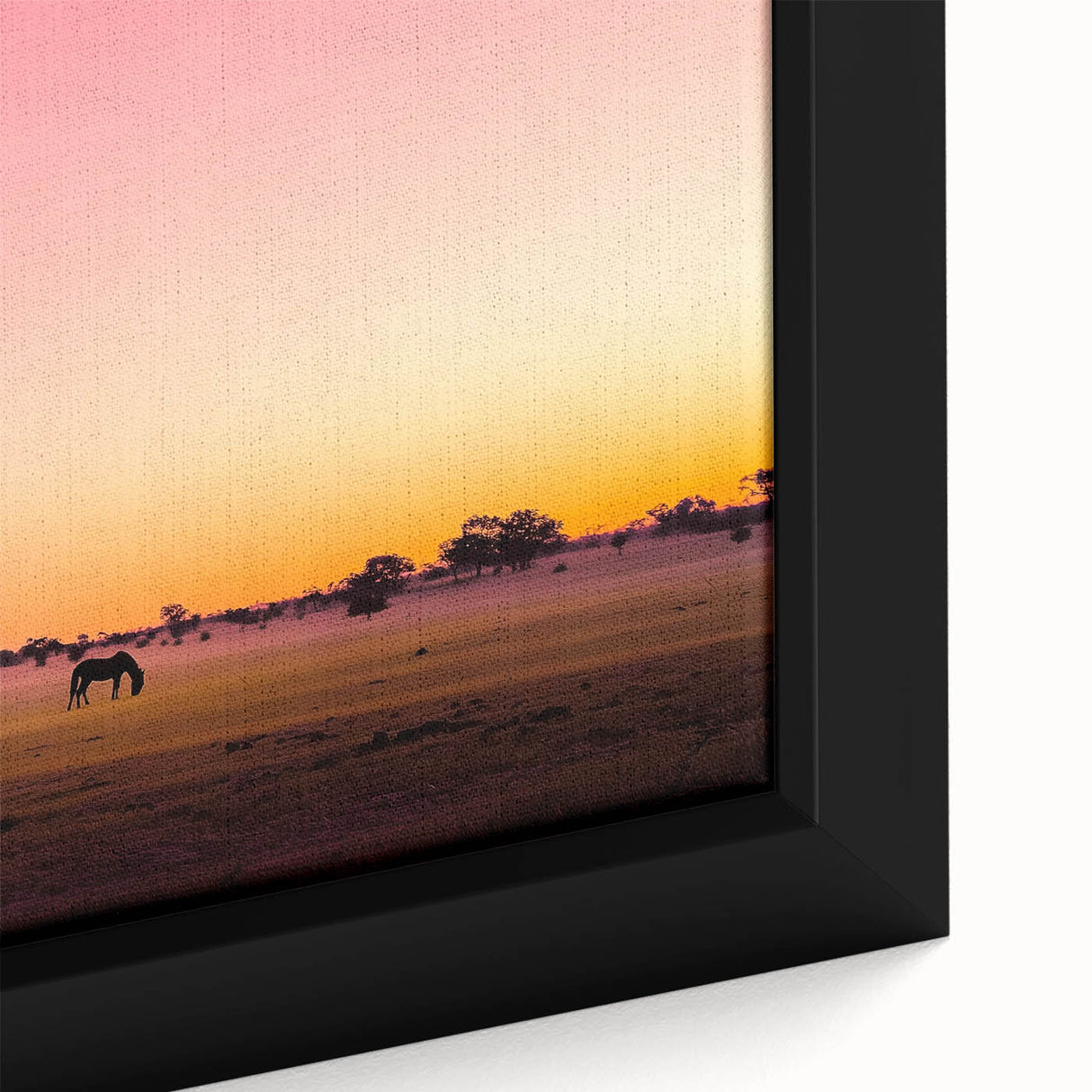 Close-up of a framed canvas showcasing a vibrant countryside landscape, featuring lush green fields, rolling hills, and a bright blue sky, ideal for home decor.