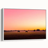 Framed canvas print showcasing a serene countryside landscape with lush green fields and distant hills, presented in a sleek white frame, ideal for home decor.