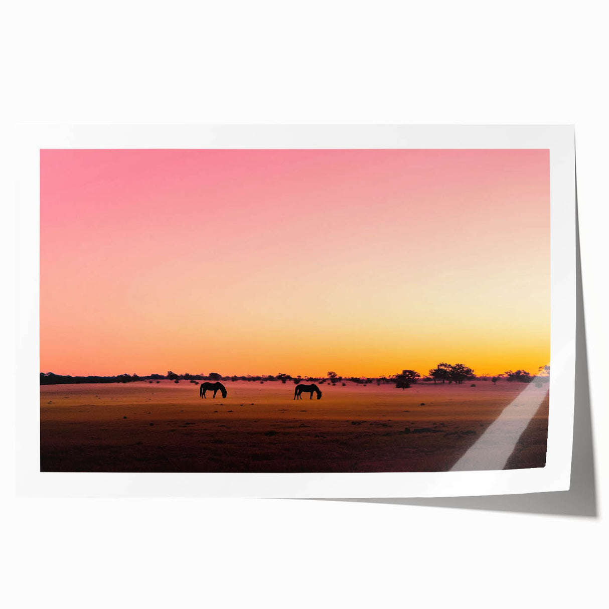 Rolled print showcasing a vibrant countryside landscape with lush greenery and rolling hills, elegantly packaged in a protective tube for easy transport.