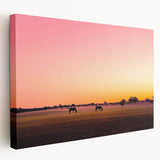 Stretched canvas artwork showcasing a serene countryside landscape with vibrant green fields and a blue sky, ideal for home décor and art enthusiasts.