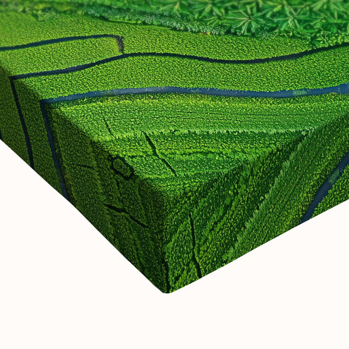 Close-up of a vibrant stretched canvas depicting a serene landscape of rolling fields under a blue sky, showcasing rich greens and earthy tones, perfect for home decor.