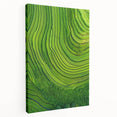 Vibrant stretched canvas artwork showcasing a serene landscape with rolling fields under a blue sky, perfect for home or office decor, enhancing tranquility and beauty.