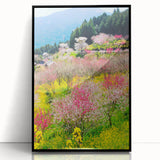 Large abstract wall art depicting spring, in vibrant green and yellow tones, framed in black acrylic.