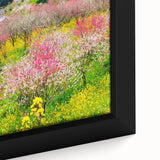 Close-up of extra large black wall art featuring a textured, colorful abstract design on framed canvas.