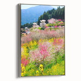 Landscape art painting on framed canvas depicting a spring scene with vibrant green and floral tones.