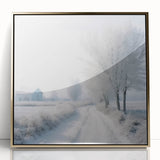 Winter scene with snow-covered trees in muted gray and blue tones, framed acrylic print.