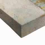 Close-up of a stretched canvas featuring vibrant abstract strokes in shades of blue, yellow, and red, ideal for modern home décor and artistic expression.