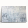Abstract strokes wall art on stretched canvas, featuring vibrant colors like blue, pink, and gold, leaning against a neutral wall, adding a modern touch to decor.