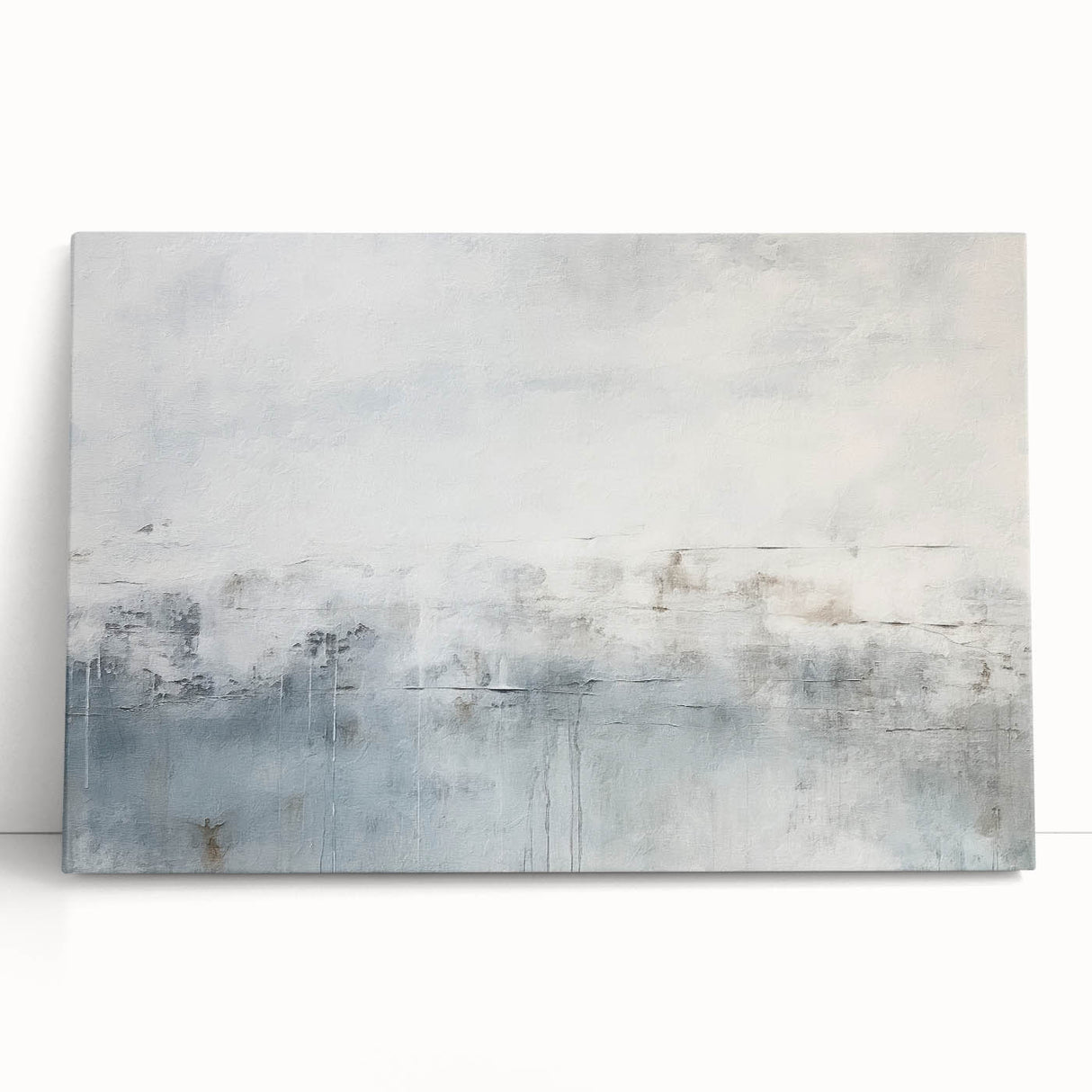 Abstract strokes wall art on stretched canvas, featuring vibrant colors of blue, pink, and yellow, leaning against a neutral wall, ideal for modern decor.