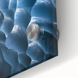 Close-up of an acrylic glass artwork showcasing vibrant landscapes and intricate cave details, perfect for modern home decor and artistic focal points.